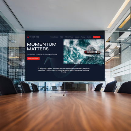 Teybridge Capital new website displayed on a projector screen in an office boardroom.